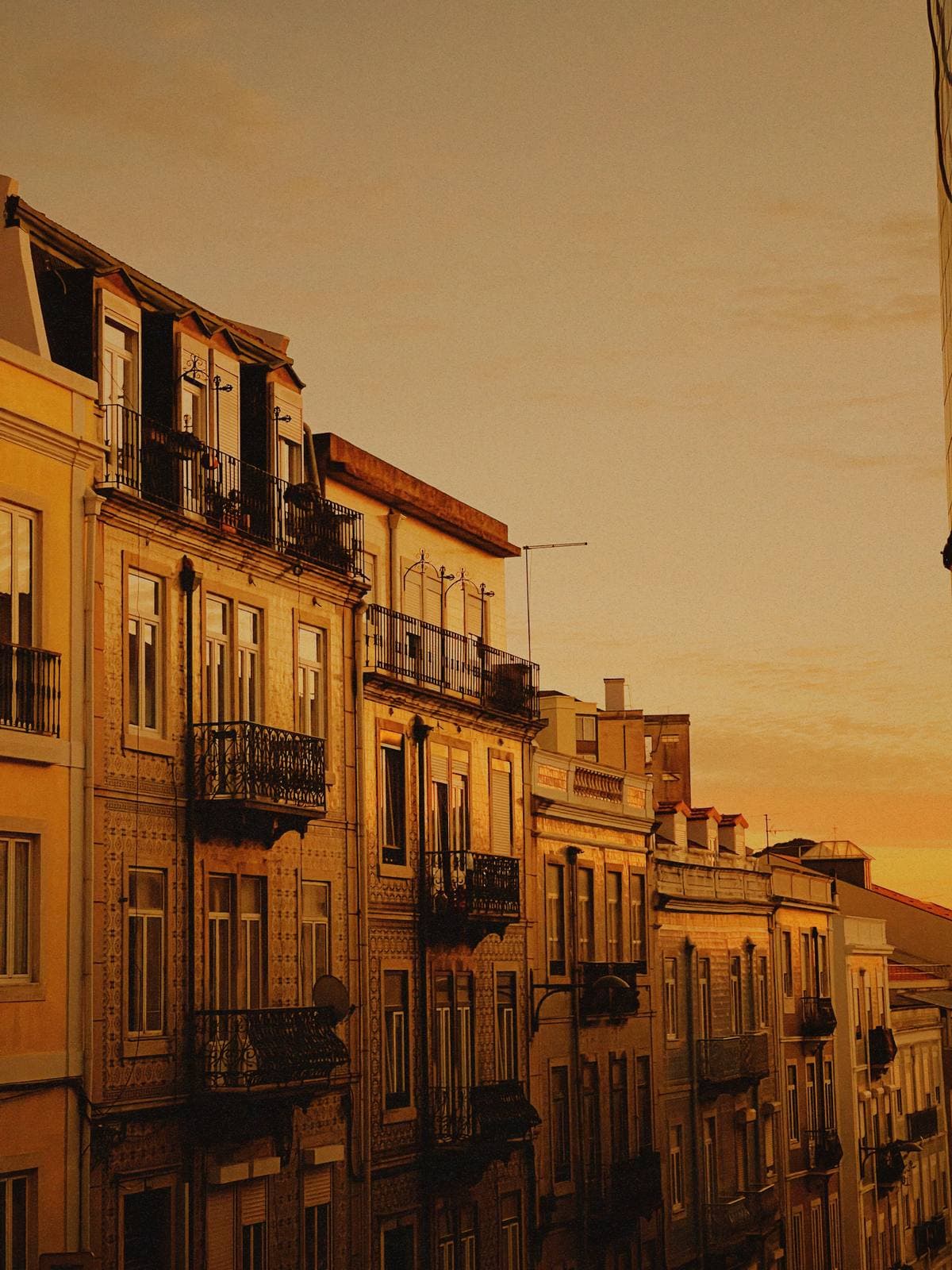 Balconies Into Amber Dusk — Penha de França, Lisbon · Fine Art Print